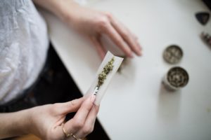 Man Rolling a Medical Cannabis Joint